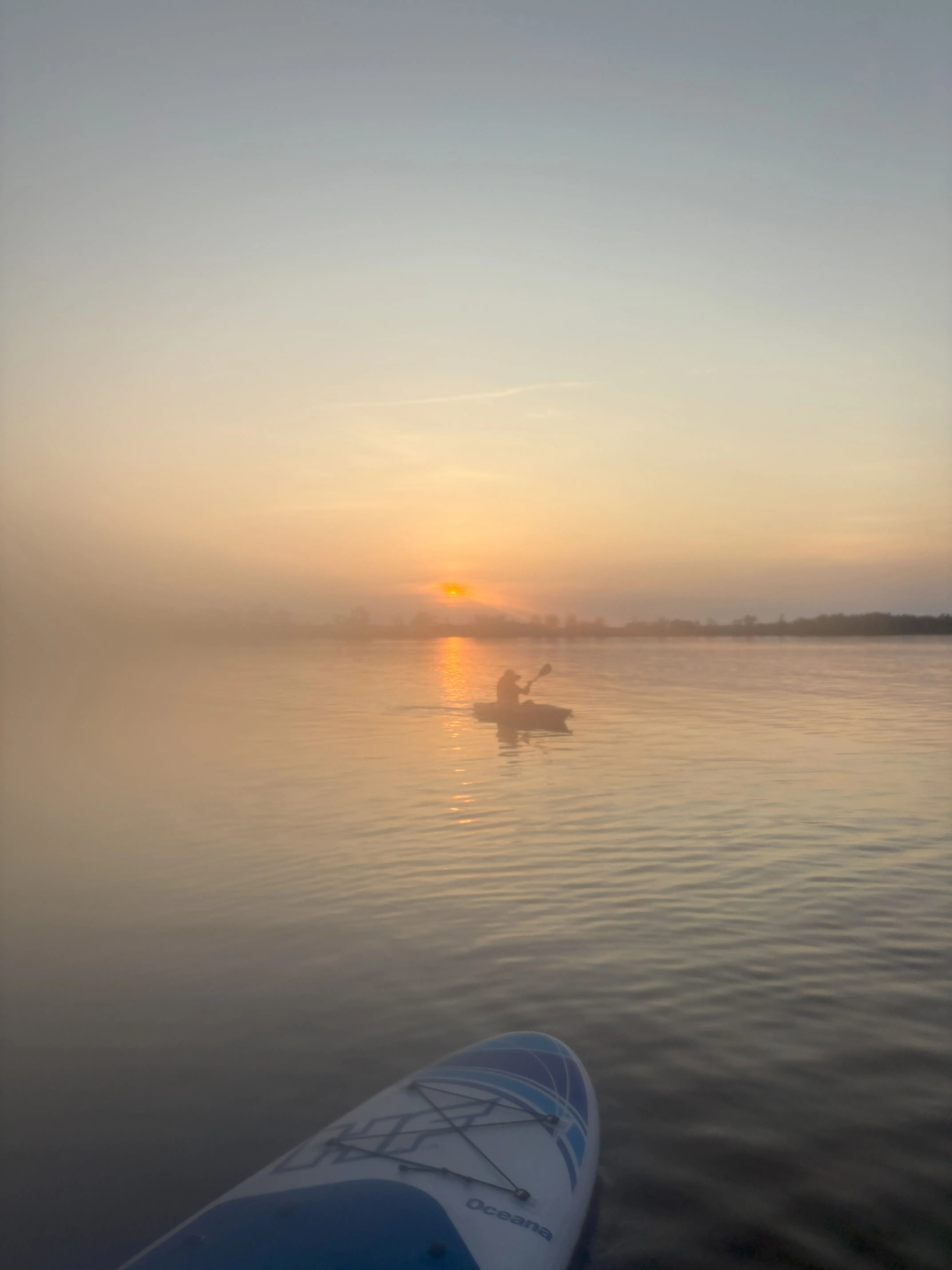 Blurry sunset taken while paddleboarding