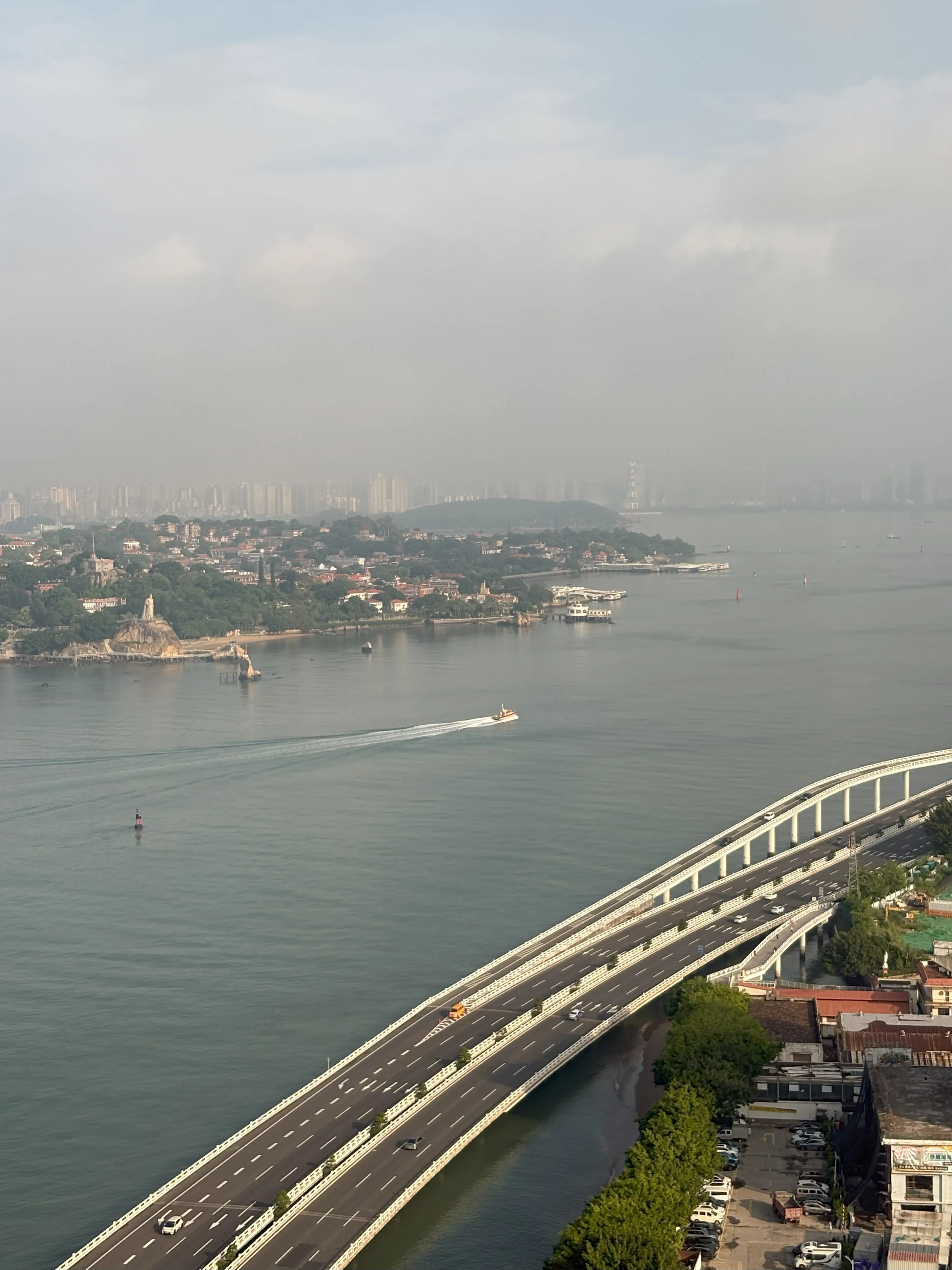 Cloudy golden hour view of Xiamen oceanfront