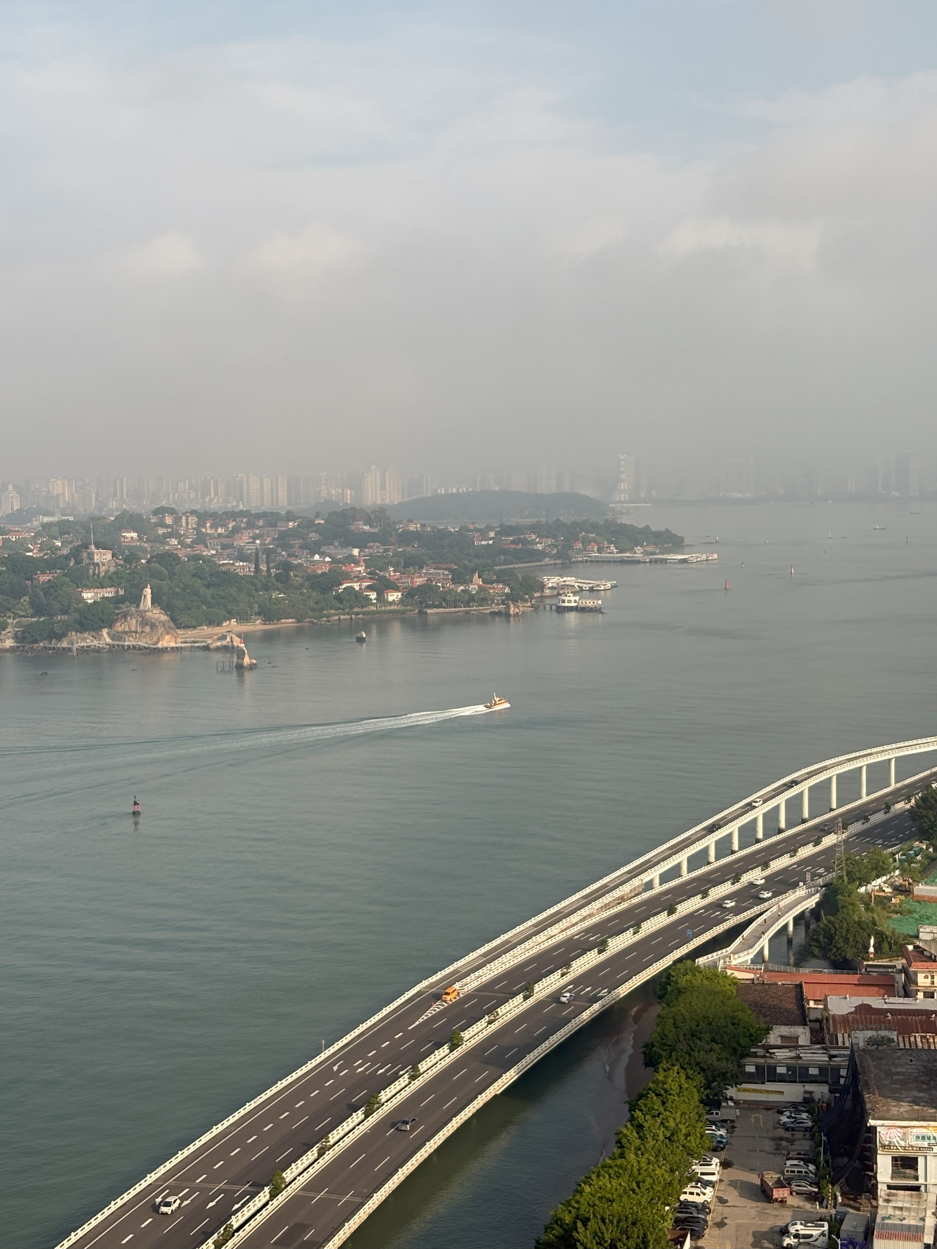 Cloudy golden hour view of Xiamen oceanfront